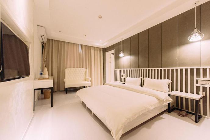 Imagen de la habitación del Hotel NINGLAI HOTEL. Foto 3