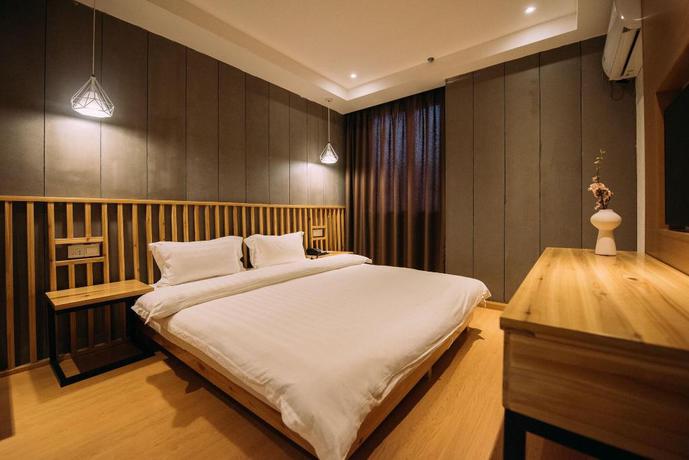 Imagen de la habitación del Hotel NINGLAI HOTEL. Foto 5
