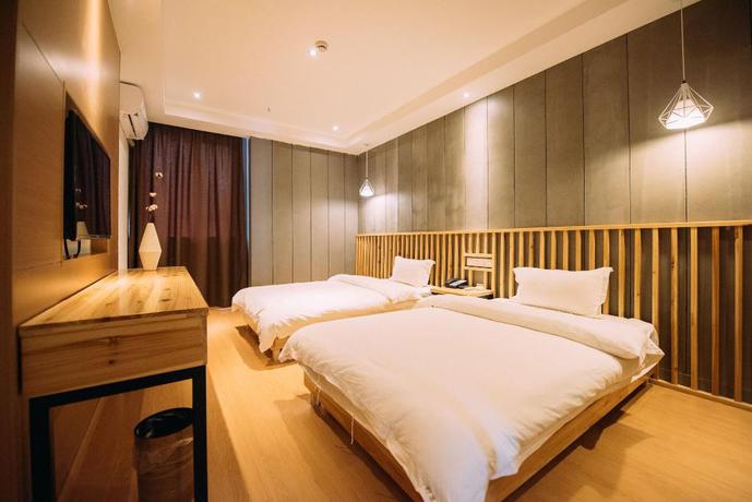 Imagen de la habitación del Hotel NINGLAI HOTEL. Foto 7