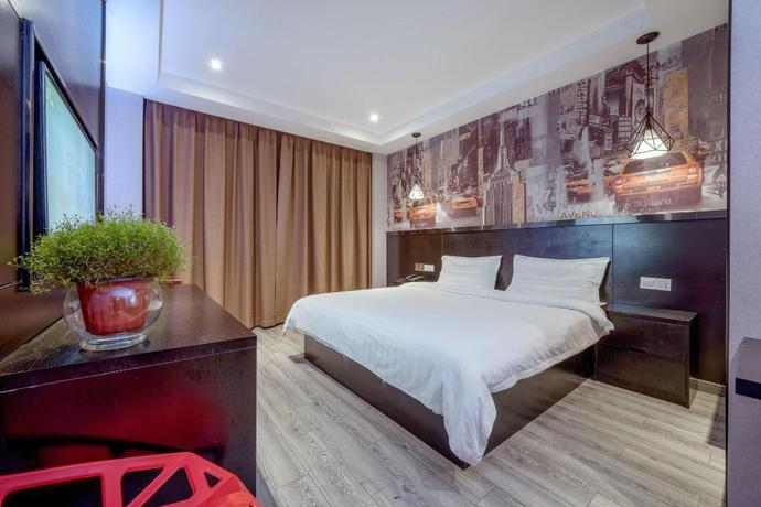 Imagen de la habitación del Hotel NINGLAI HOTEL. Foto 10