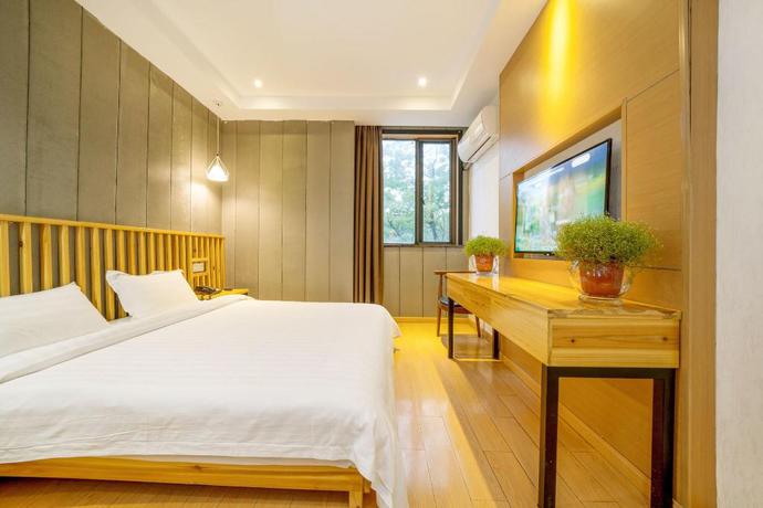 Imagen de la habitación del Hotel NINGLAI HOTEL. Foto 11