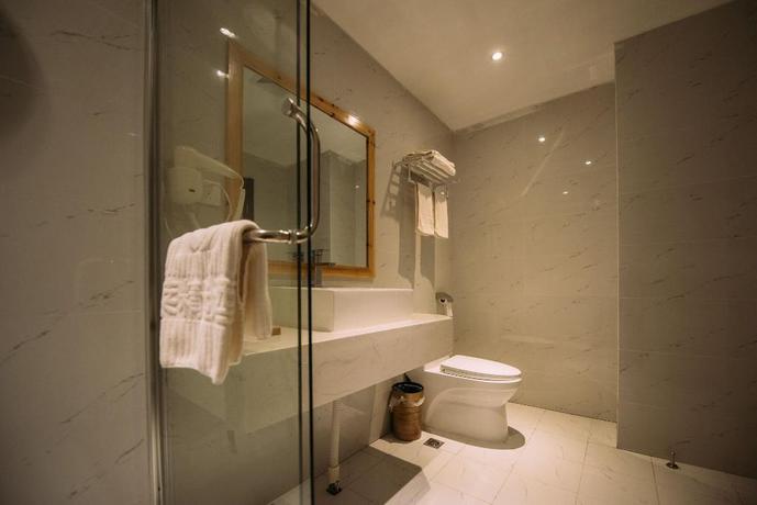 Imagen de la habitación del Hotel NINGLAI HOTEL. Foto 12