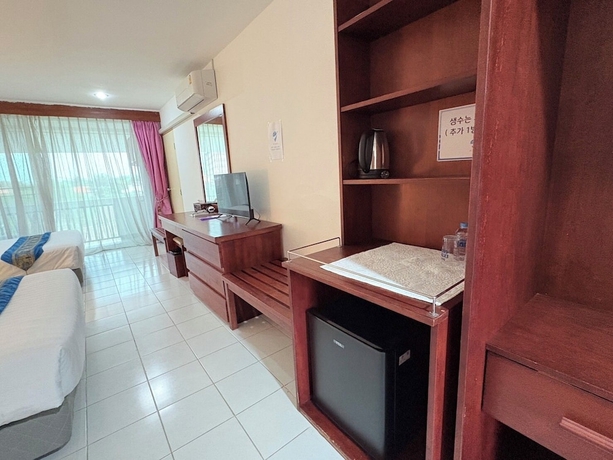 Imagen de la habitación del Hotel NJ INTHAI HOTEL. Foto 2