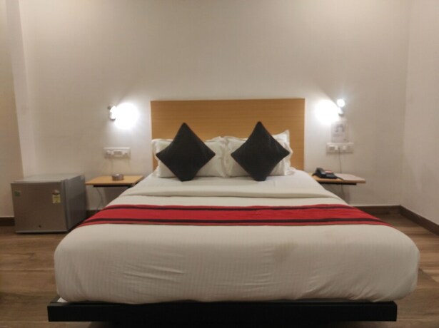 Imagen de la habitación del Hotel NK - Guwahati. Foto 19