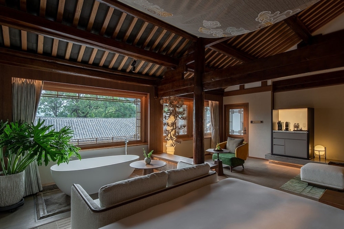 Imagen de la habitación del Hotel NMAN QIANXUE CASTLE. Foto 3