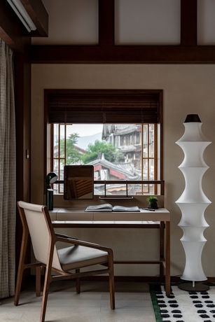 Imagen de la habitación del Hotel NMAN QIANXUE CASTLE. Foto 8