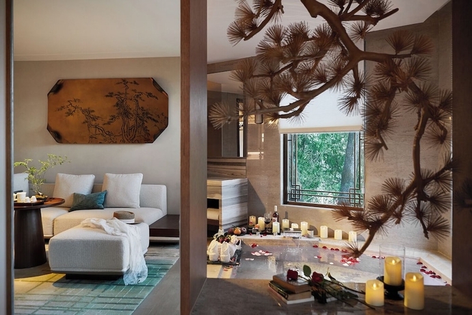 Imagen de la habitación del Hotel NMAN QIANXUE CASTLE. Foto 9
