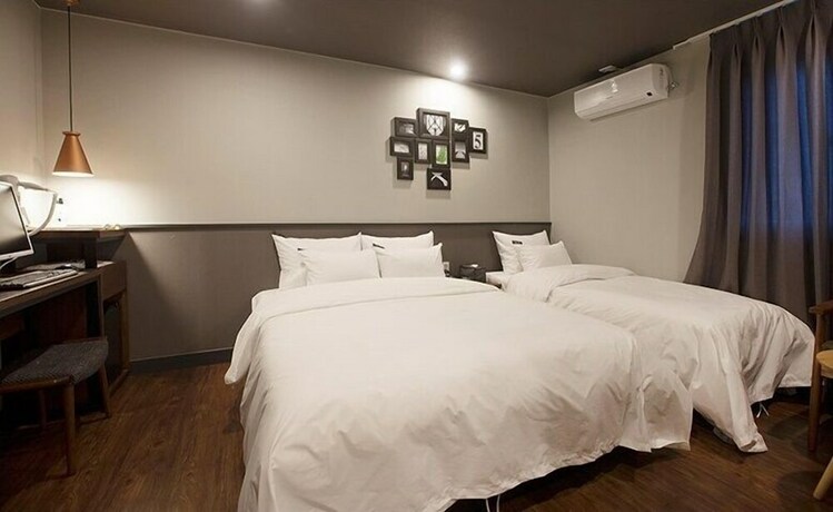 Imagen de la habitación del Hotel NO.25 HOTEL. Foto 16