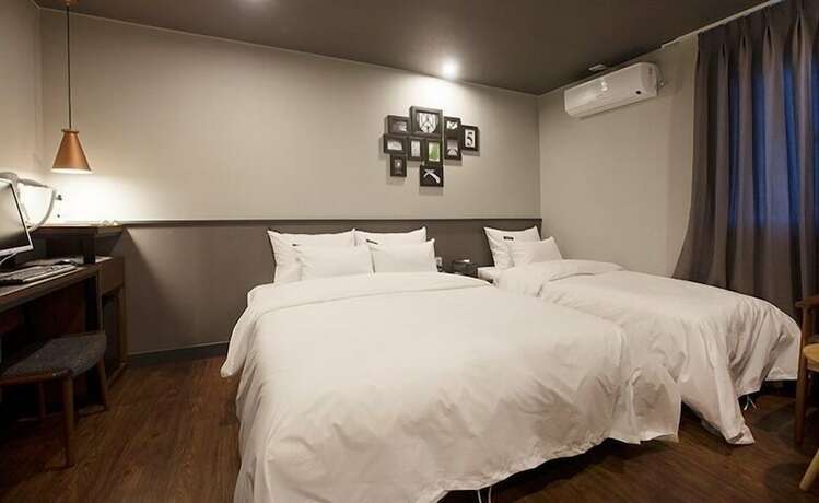 Imagen de la habitación del Hotel NO.25 HOTEL. Foto 18