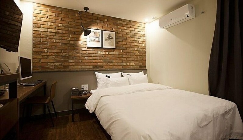 Imagen de la habitación del Hotel NO.25 HOTEL. Foto 20