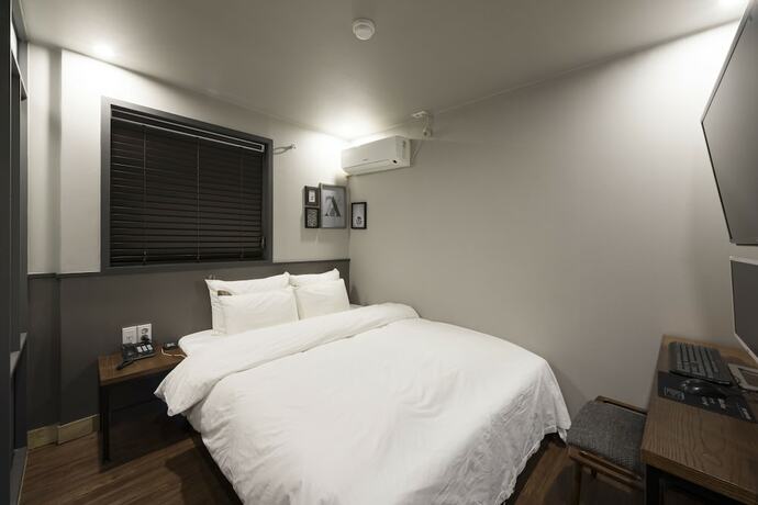 Imagen de la habitación del Hotel NO.25 HOTEL. Foto 22