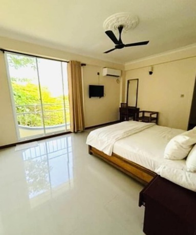 Imagen de la habitación del Hotel NOAH BEACH HOUSE. Foto 3