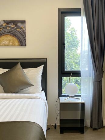 Imagen de la habitación del Hotel NORN Riverside Bangkok. Foto 13