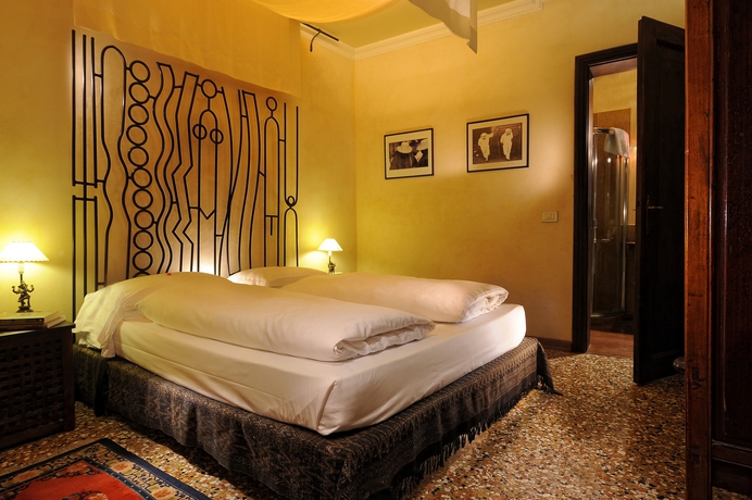 Imagen de la habitación del Hotel NOVECENTO BOUTIQUE. Foto 6