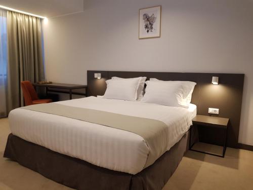 Imagen de la habitación del Hotel NOVO Boutique. Foto 6