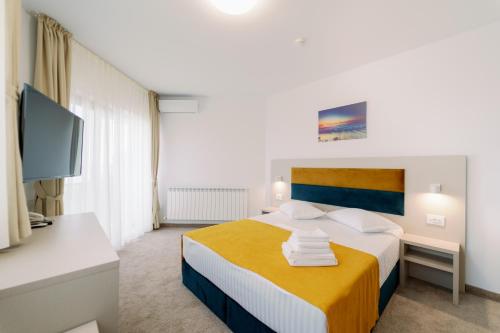 Imagen de la habitación del Hotel NOVUS. Foto 16