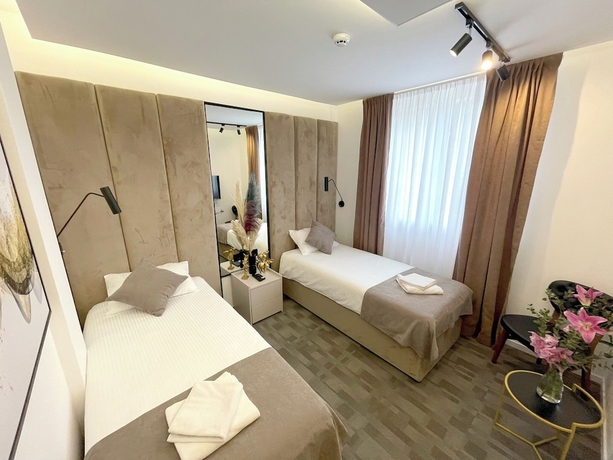Imagen de la habitación del Hotel NPL CODE. Foto 4