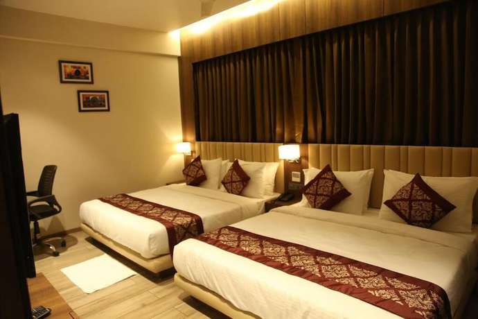 Imagen de la habitación del Hotel NRICH SKYOTEL. Foto 13