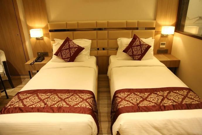 Imagen de la habitación del Hotel NRICH SKYOTEL. Foto 16