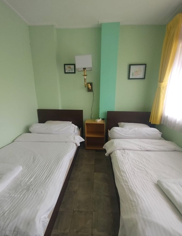 Imagen de la habitación del Hotel NTC Lembang by Kuncara PHM. Foto 6
