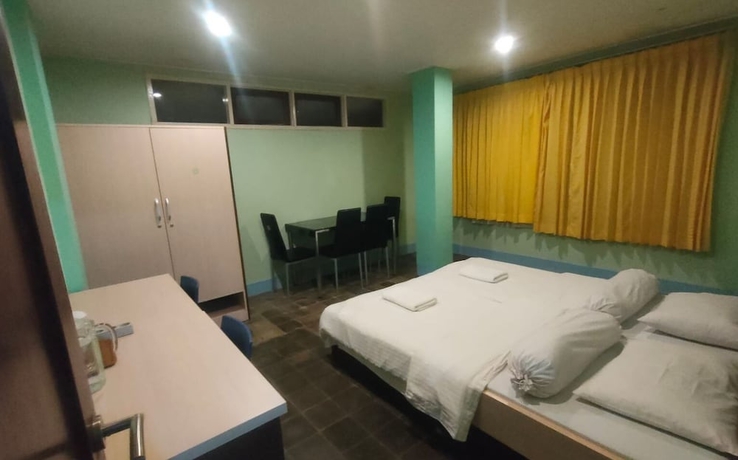 Imagen de la habitación del Hotel NTC Lembang by Kuncara PHM. Foto 8