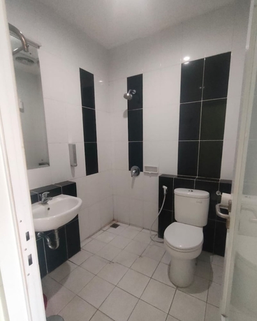 Imagen de la habitación del Hotel NTC Lembang by Kuncara PHM. Foto 11