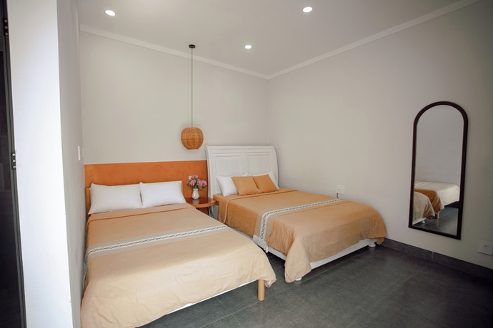 Imagen de la habitación del Hotel NUBA Homestay and Coffee Buon Ma Thuot. Foto 2