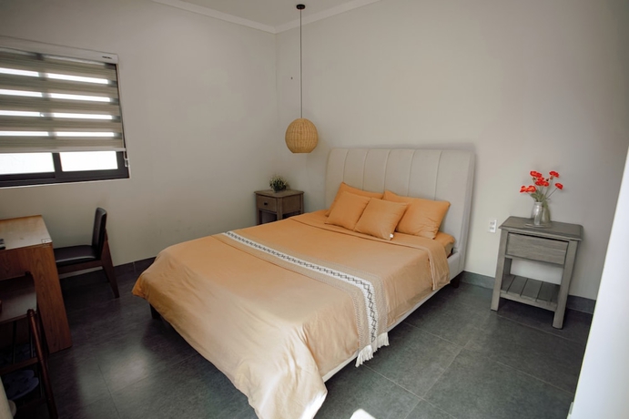 Imagen de la habitación del Hotel NUBA Homestay and Coffee Buon Ma Thuot. Foto 7
