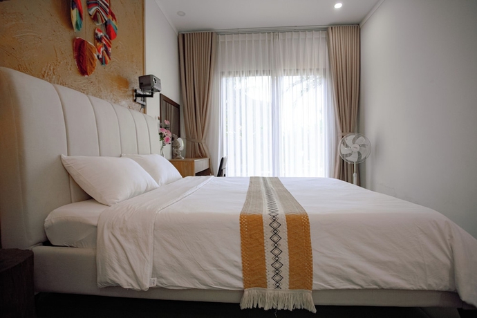 Imagen de la habitación del Hotel NUBA Homestay and Coffee Buon Ma Thuot. Foto 9
