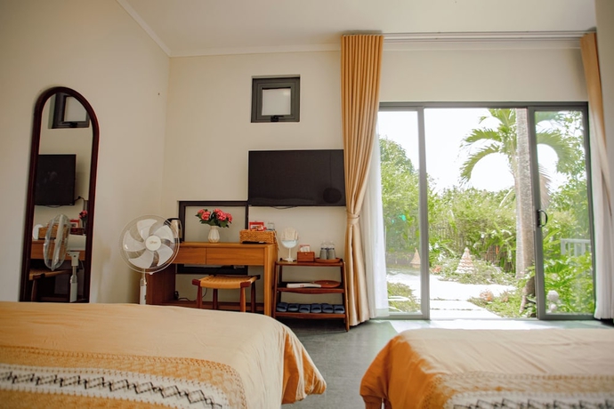 Imagen de la habitación del Hotel NUBA Homestay and Coffee Buon Ma Thuot. Foto 12
