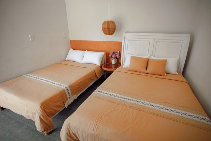 Imagen de la habitación del Hotel NUBA Homestay and Coffee Buon Ma Thuot. Foto 13