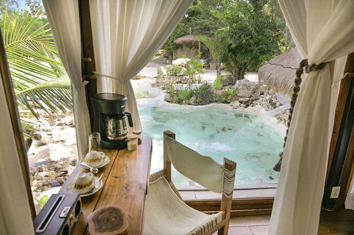 Imagen de la habitación del Hotel NUNUM-Luxury Tenting. Foto 18