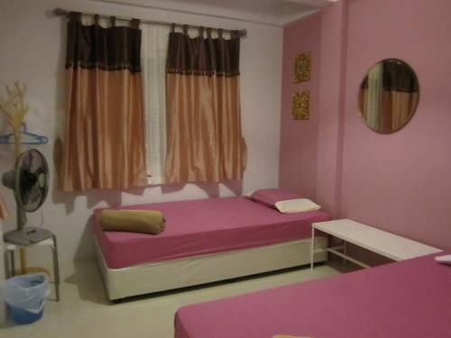 Imagen de la habitación del Hotel Na Na Chart Phuket. Foto 31