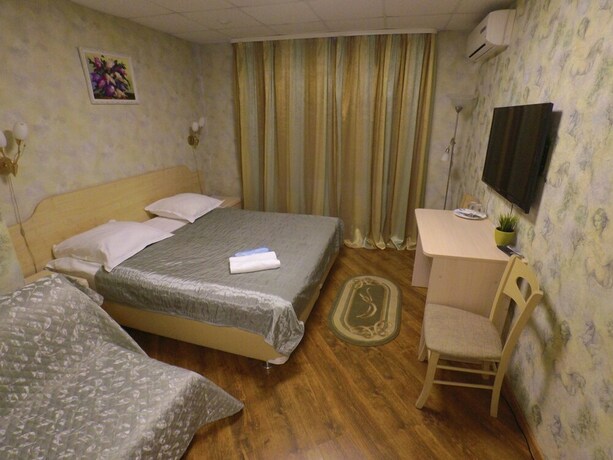Imagen de la habitación del Hotel Na Okskoy. Foto 5