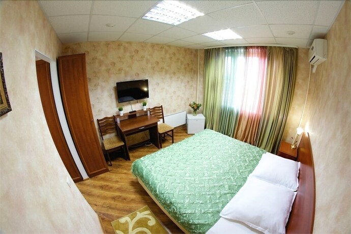 Imagen de la habitación del Hotel Na Okskoy. Foto 11