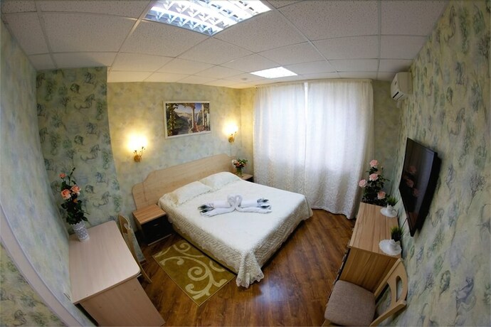 Imagen de la habitación del Hotel Na Okskoy. Foto 17