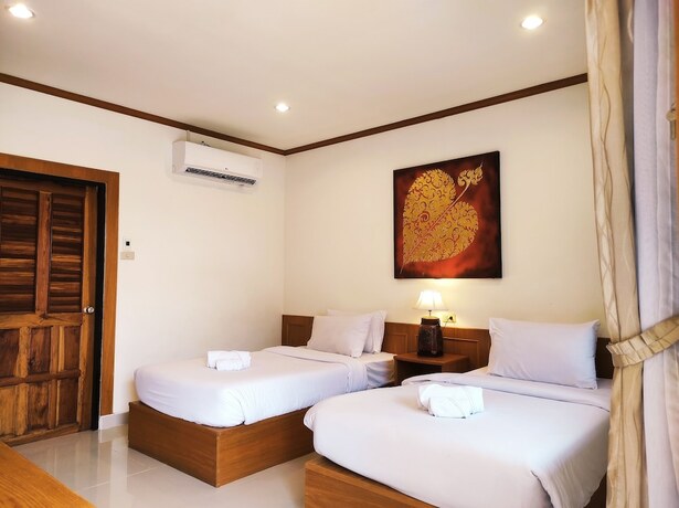 Imagen de la habitación del Hotel Na Soi 5 Chiangkhan. Foto 28