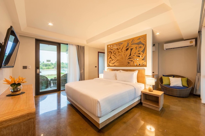 Imagen de la habitación del Hotel Na Tree Tara Riverside Resort. Foto 5