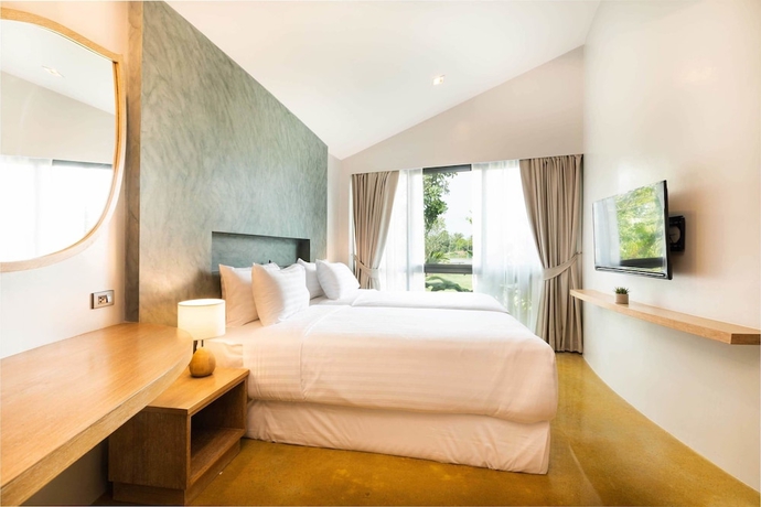 Imagen de la habitación del Hotel Na Tree Tara Riverside Resort. Foto 15