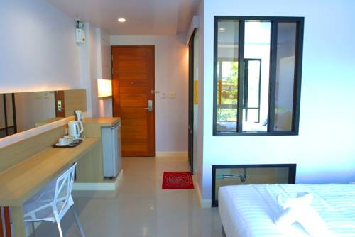 Imagen de la habitación del Hotel Na Tubthieng Boutique Resort. Foto 8