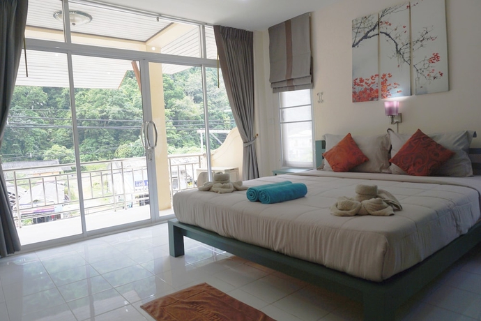 Imagen de la habitación del Hotel Na Vela Village. Foto 4