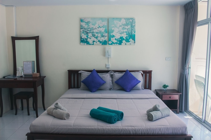 Imagen de la habitación del Hotel Na Vela Village. Foto 6
