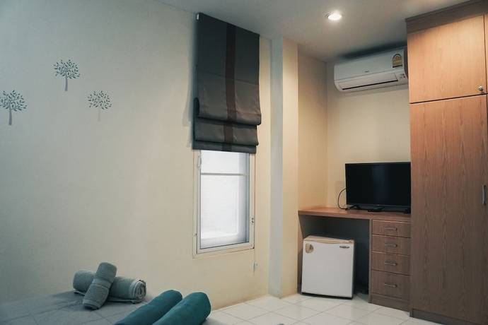 Imagen de la habitación del Hotel Na Vela Village. Foto 17