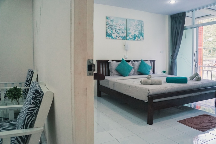 Imagen de la habitación del Hotel Na Vela Village. Foto 18