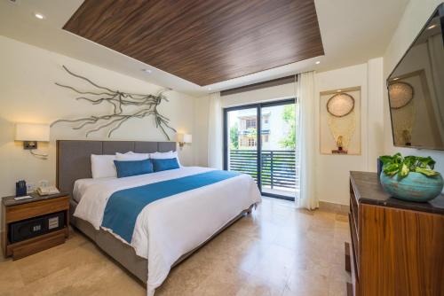 Imagen de la habitación del Hotel Náay Tulum Curamoria Collection. Foto 8