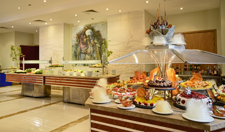 Imagen del bar/restaurante del Hotel Naama Bay Hotel and Resort. Foto 7