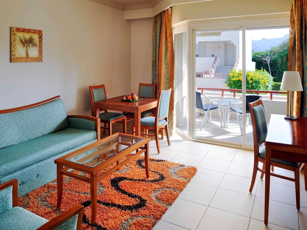 Imagen de la habitación del Hotel Naama Bay Promenade Beach Resort. Foto 14