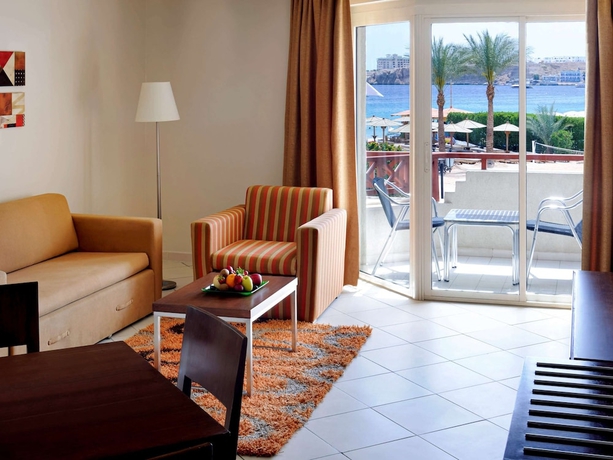 Imagen de la habitación del Hotel Naama Bay Promenade Beach Resort. Foto 16