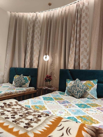 Imagen de la habitación del Hotel Naari Home Stay. Foto 10