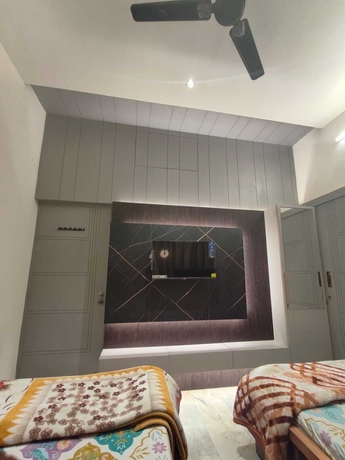 Imagen de la habitación del Hotel Naari Home Stay. Foto 11